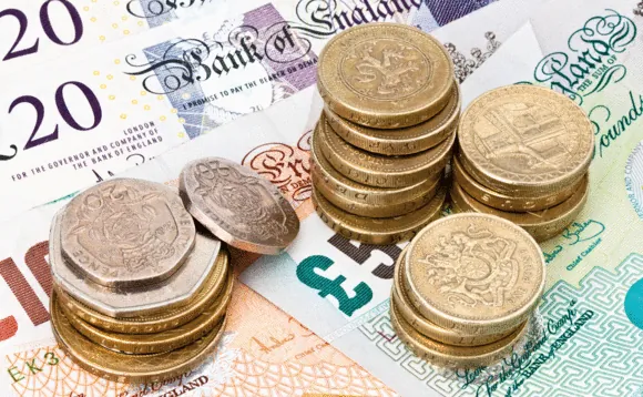 Pound coins and banknotes